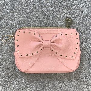 pink studded bow wristlet